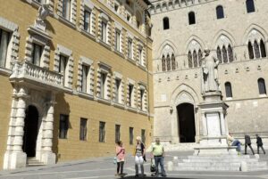 Mps: si rafforza l’Opas di Intesa. Con l’impegno di Delfin. Gli analisti vedono Lovaglio in difficoltà